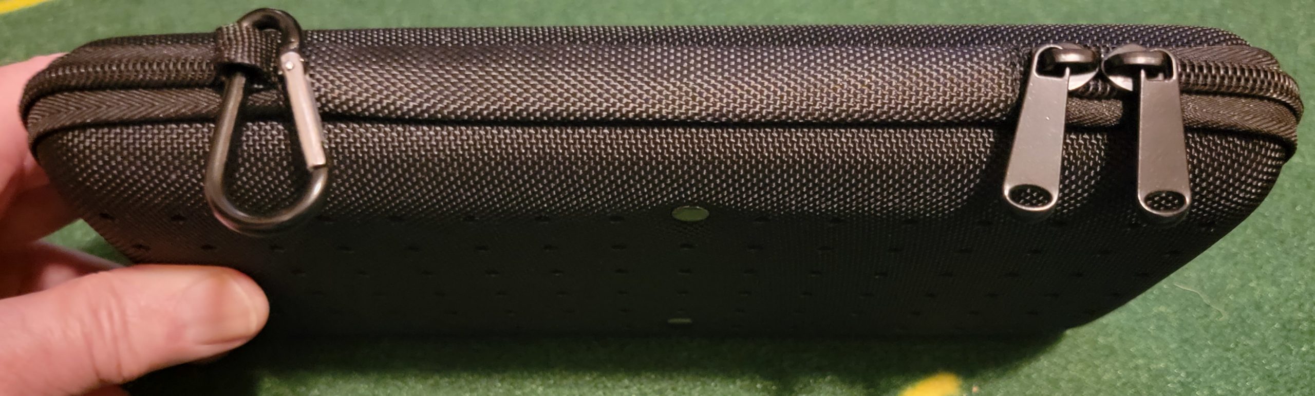 Old Duffer Golf image of a golf accessory case with carabiner and dual zippers