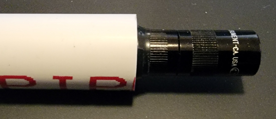 Old Duffer Golf image of a maglite light stick